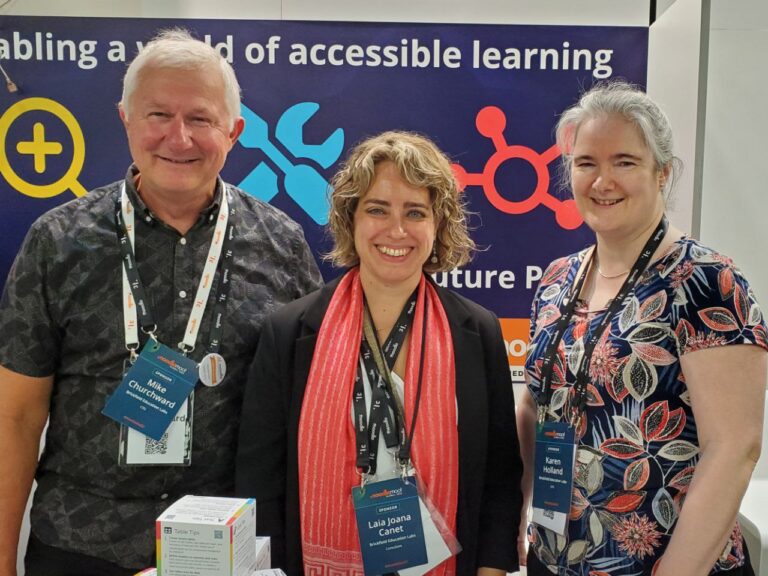 Mike, Laia and Karen in front of the Brickfield Education Labs stand.